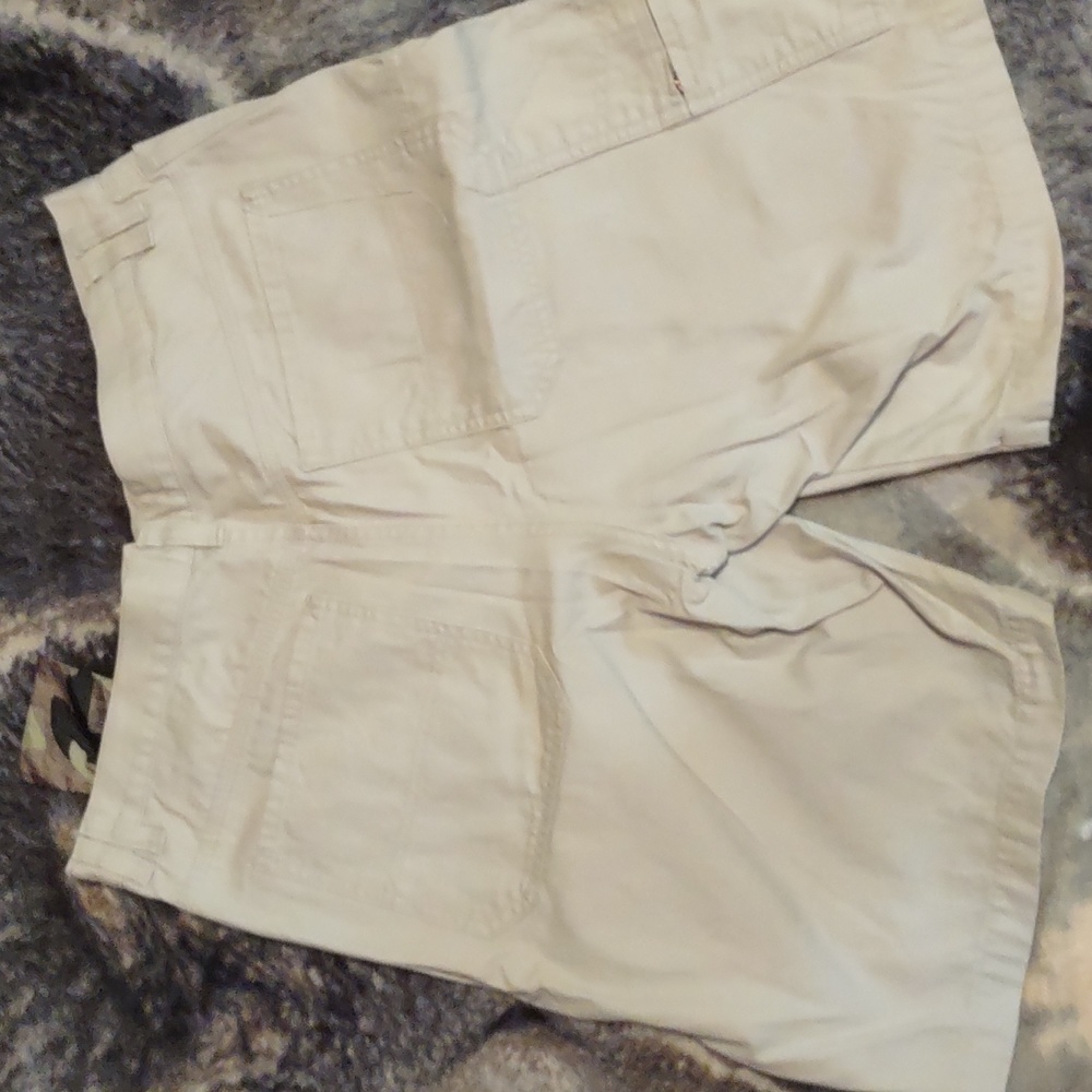 This is a pair of Phillips 66 khaki shorts size 34 ways beautiful shape lke New